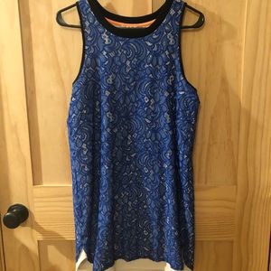 Blue and white lace mini dress with black trim